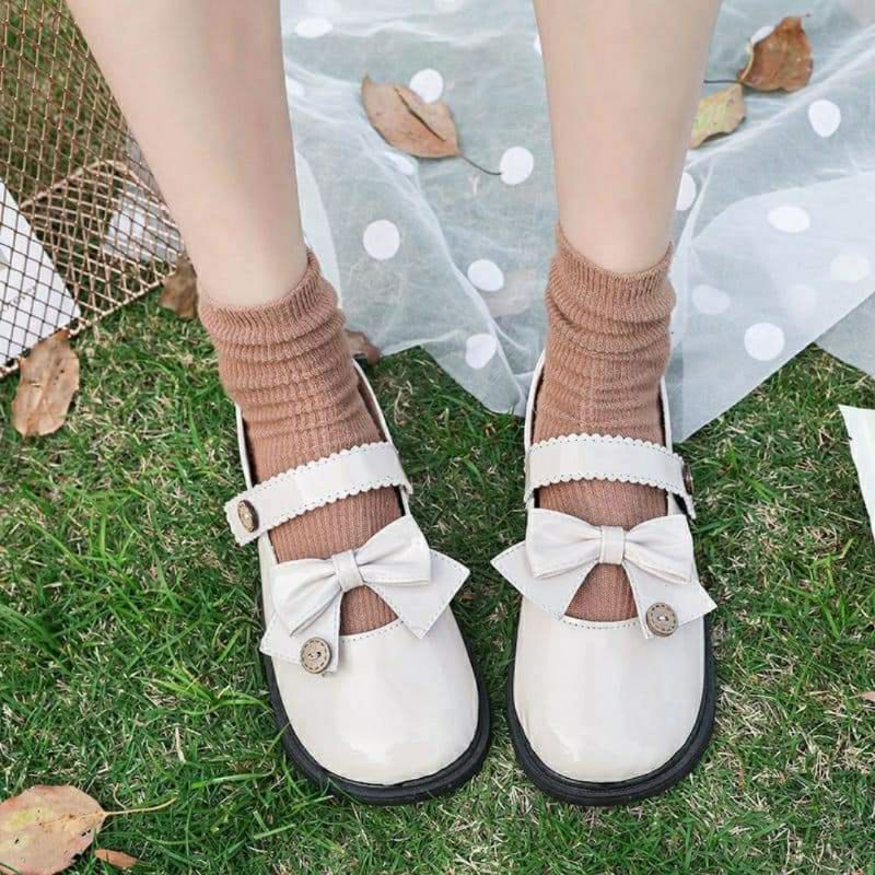 Giày búp bê nữ màu trắng gắn nơ