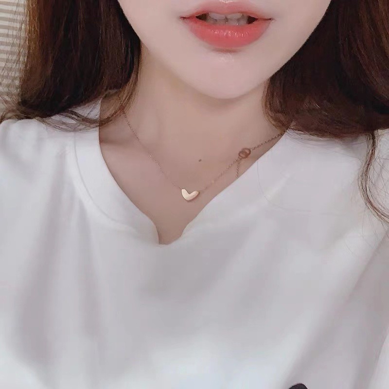 Dây Chuyền Thép Titan Mạ Vàng Hồng 18K Mặt Hình Trái Tim Đính Đá Zircon Phối Tua Rua Thời Trang Cho Nữ
