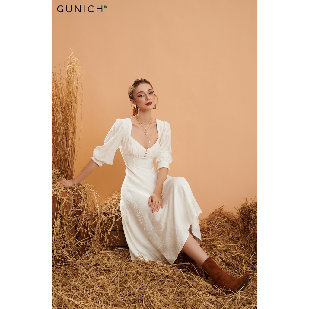 Đầm midi tay lỡ màu trắng Gunich