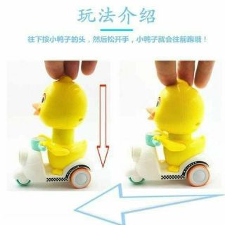 Đồ chơi vịt nhấn cót