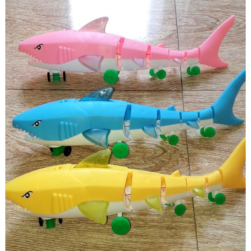 Một Cá_Mập mô hình bằng nhựa dài 32 cm chạy pin có nhạc và đèn Led rất đep_tặng kèm pin