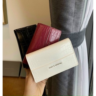 Ví cầm tay Charles &Keith Vnxk cho nữ màu trắng