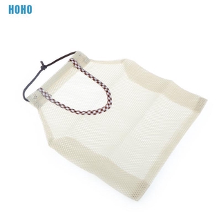 Túi lưới treo đựng hành tỏi trong nhà bếp