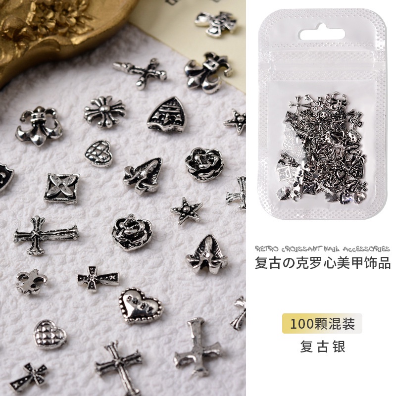 Set 100 Phụ Kiện Trang Trí Móng Tay Nghệ Thuật Bằng Hợp Kim Croxin Phong Cách Punk