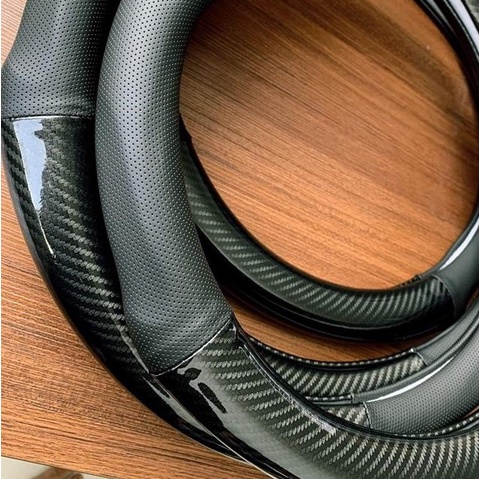Bọc vô lăng CARBON phối da thoáng khí đủ các hãng xe Toyota-Honda-Hyundai-Mazda-KiA-Ford-Mitshubishi-Chevrolet cao cấp