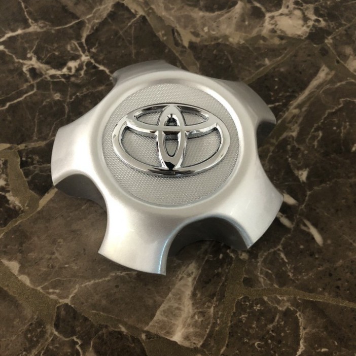 Sản Phẩm Logo chụp mâm, ốp lazang bánh xe ô tô Toyota RAV4 2009-2013 TY-030 .
