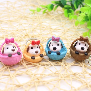 Móc khóa cún ngồi giỏ
