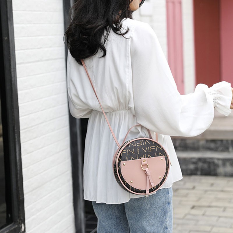 Túi đeo chéo dáng tròn nhỏ sành điệu cho nữ IELGY