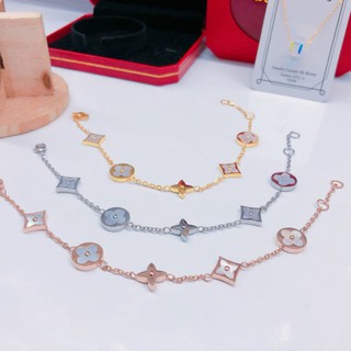 Lắc tay titan LV xà cừ