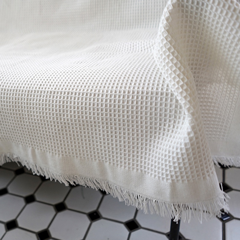 Chăn phủ sofa mềm mại phối tua rua đơn giản