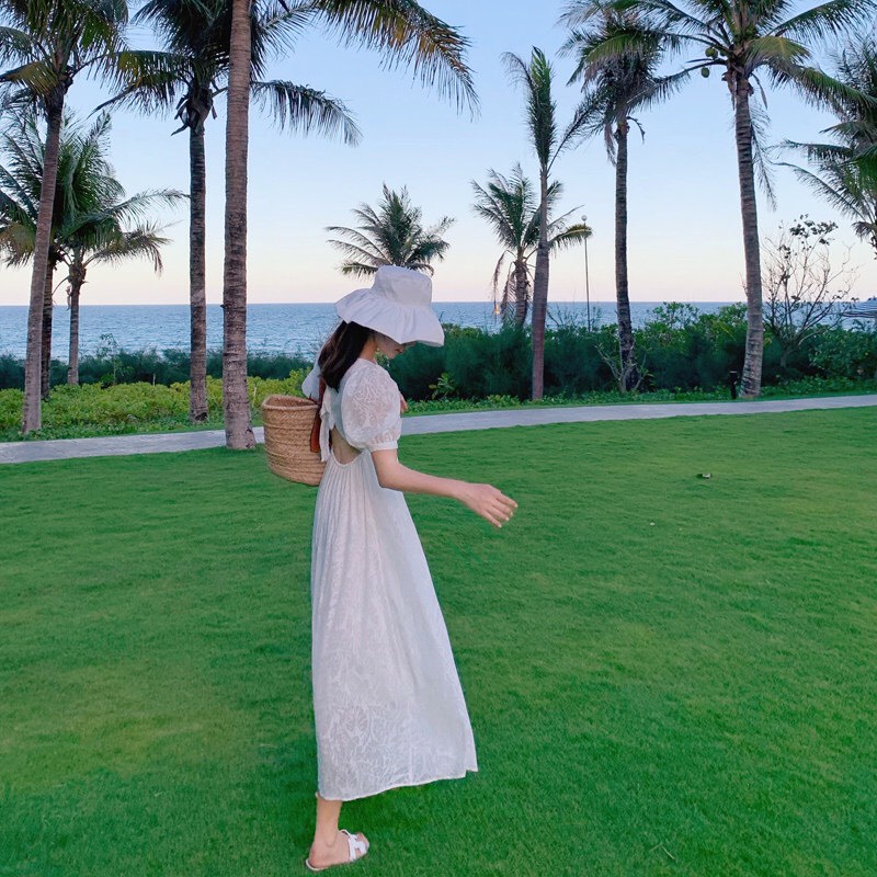 Đầm Maxi Đi Biển Hở Lưng Sang Trọng Váy Trắng Tiểu Thư Nơ Sau Tay Bồng Dáng Xòe Mặc Đi Tiệc Hay Đi Chơi Style Hàn V01
