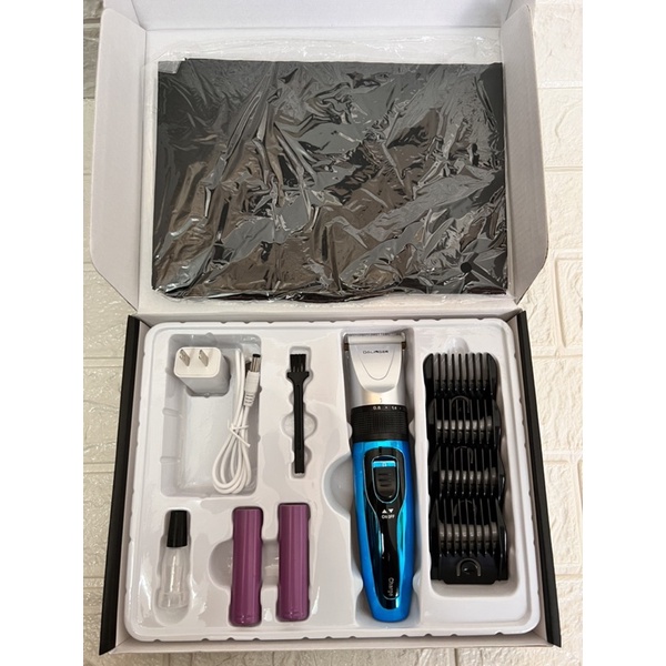 Tông đơ cắt tóc DALING 110 tặng kèm 01 pin sạc dự phòng, 1 áo choàng cắt tóc