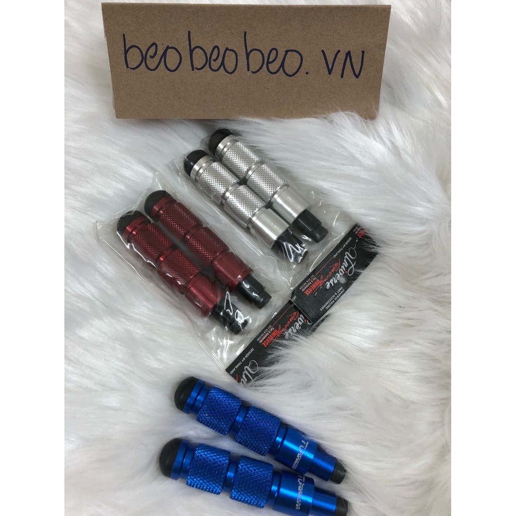 gù chống đổ xe