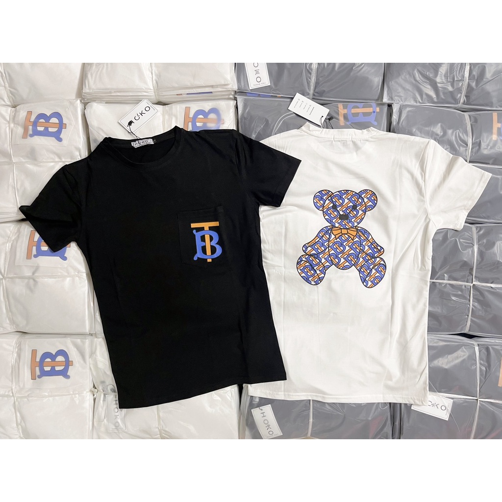 Áo thun nam nữ cổ tròn tay ngắn in gấu phối túi trước chữ TB , áo chất cotton thoáng mát thời trang hè hot trend 2022
