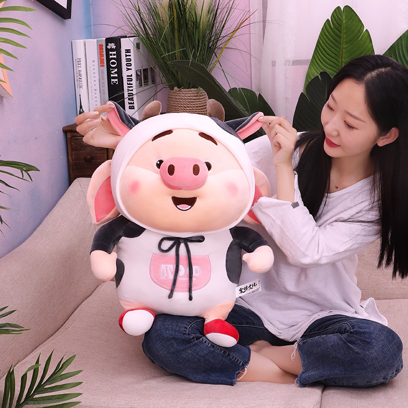 Thú bông heo tik tok mang áo bò sữa
