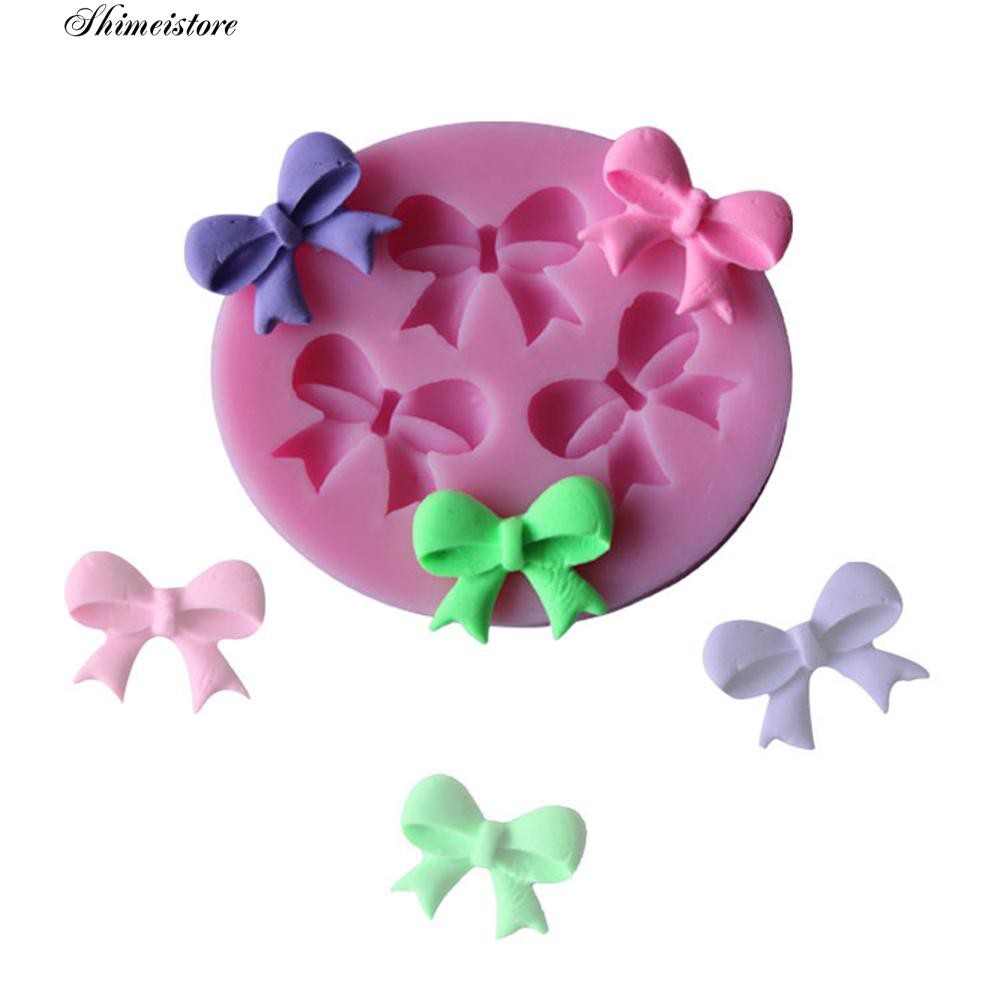 Khuôn Làm Bánh / Sô Cô La Bằng Chất Liệu Silicone Hình Nơ Xinh Xắn