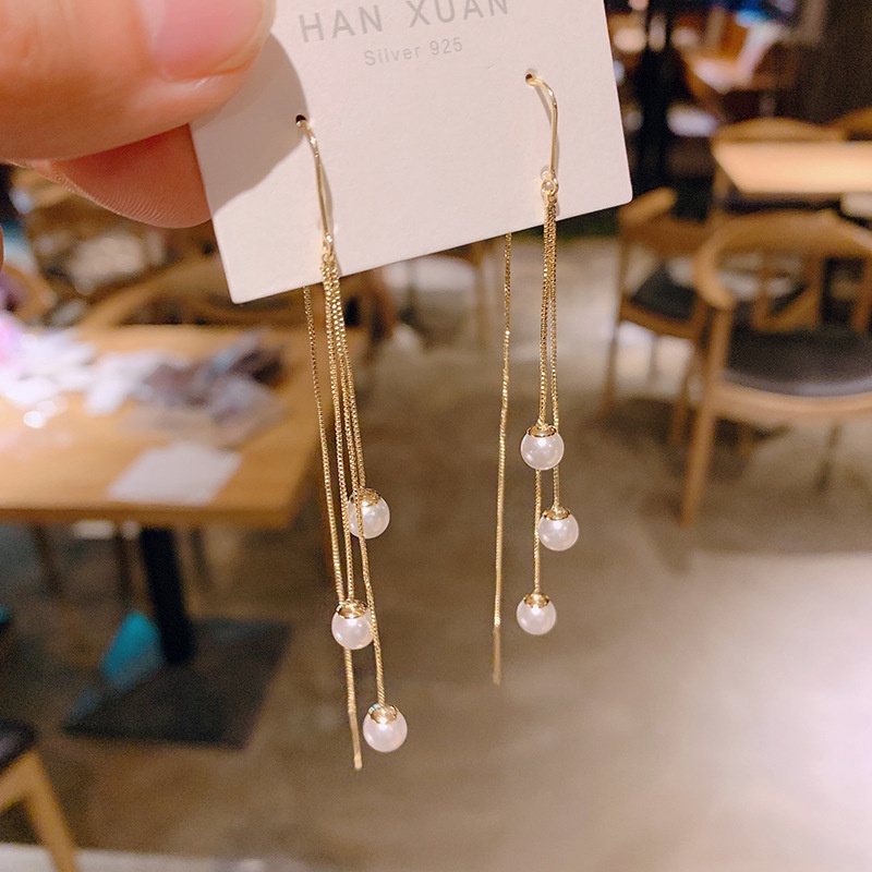 Khuyên tai dáng dài phối tua rua màu bạc thời trang