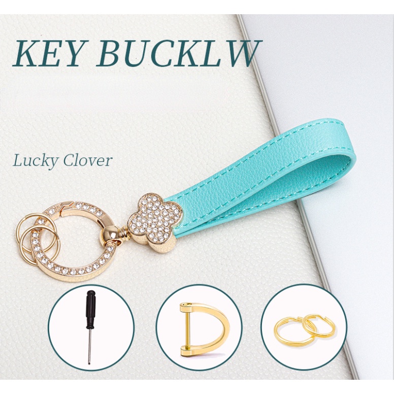 Móc Khóa Hình Cỏ Bốn Lá Đính Pha Lê Tua Rua Xinh Xắn