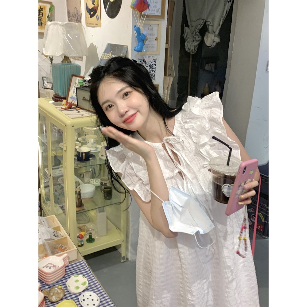 Váy trắng xoè ngắn babydoll điệi đà, phối bèo vai cánh tiên xinh xắn đáng yêu