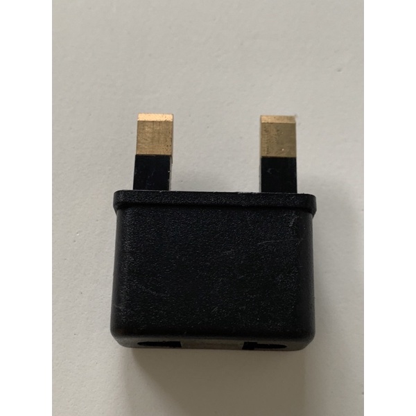 Phích chuyển 2 chân Anh  ra ổ đa năng 2 lỗ