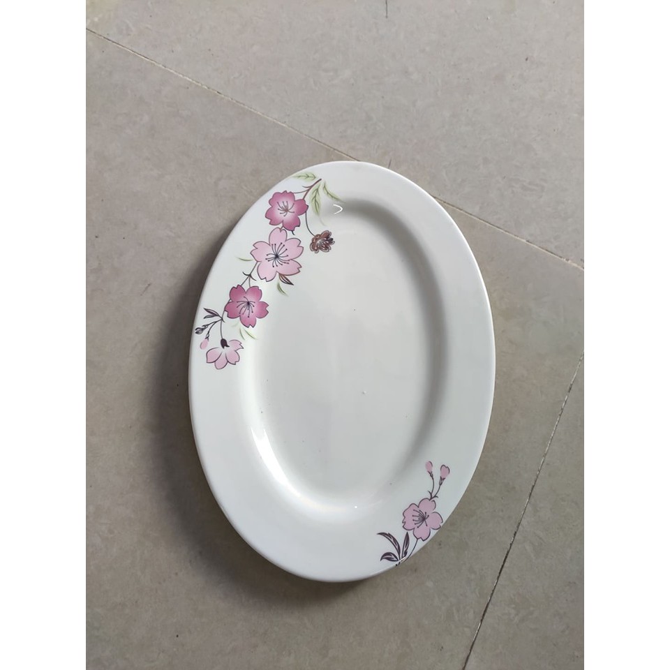 Đĩa bầu dục sứ