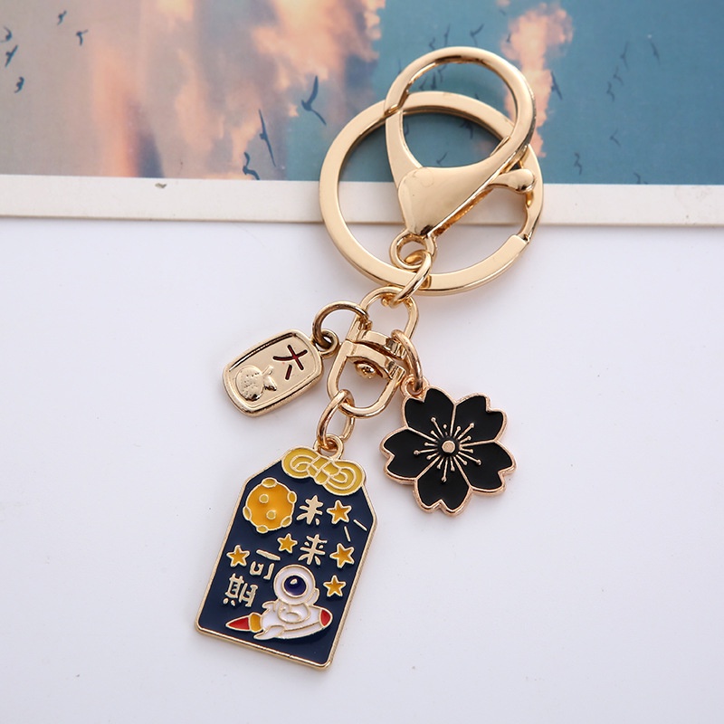 MÓC KHÓA OMAMORI MAY MẮN BẰNG KIM LOẠI QUÀ TẶNG Ý NGHĨA