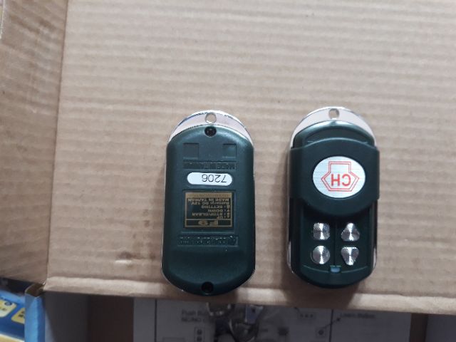 Remote cửa cuốn CH 365 mhz đèn đỏ