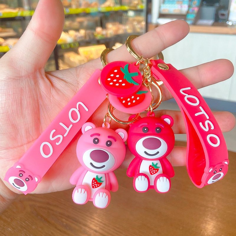 Móc Chìa Khóa Bằng PVC Hình Gấu Và Quả Dâu Dễ Thương