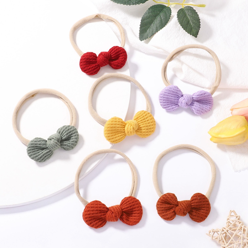 Băng đô KIDSBOWS nylon co giãn đính nơ nhỏ màu trơn 2.5inch dễ thương cho bé gái