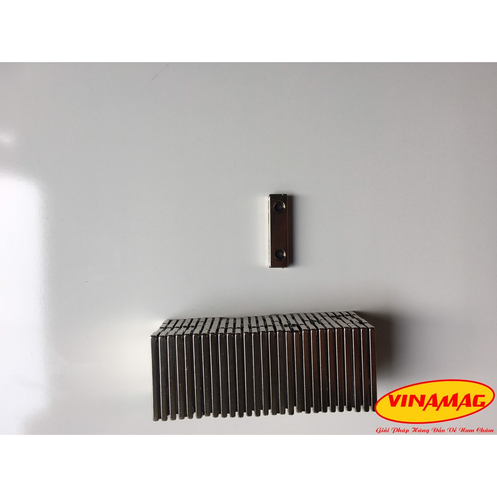 Nam châm cửa gỗ, nam châm trắng hình chữ nhật có lỗ 40x10x3 có 2 lỗ vát