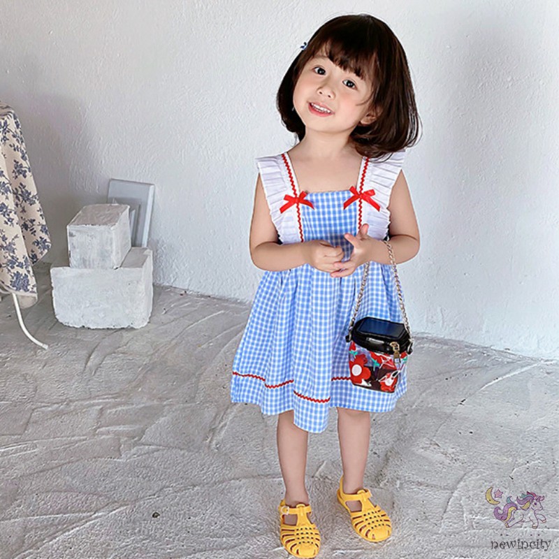 Đầm Sọc Caro Thắt Nơ Cho Bé Gái