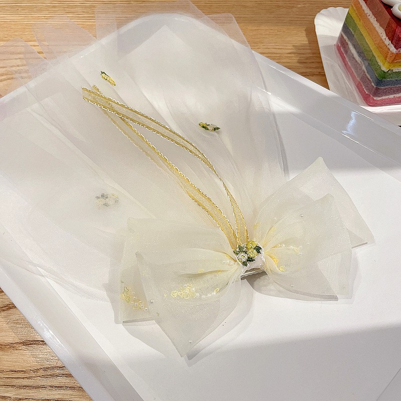 Áo lưới hai lớp thêu hoa đính nơ phong cách Hàn Quốc