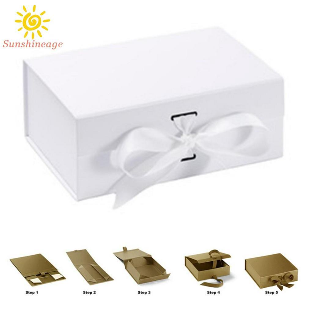 Hộp quà chất liệu dày cứng cỡ 23 * 17 * 7cm có nam châm kèm dây ruy băng