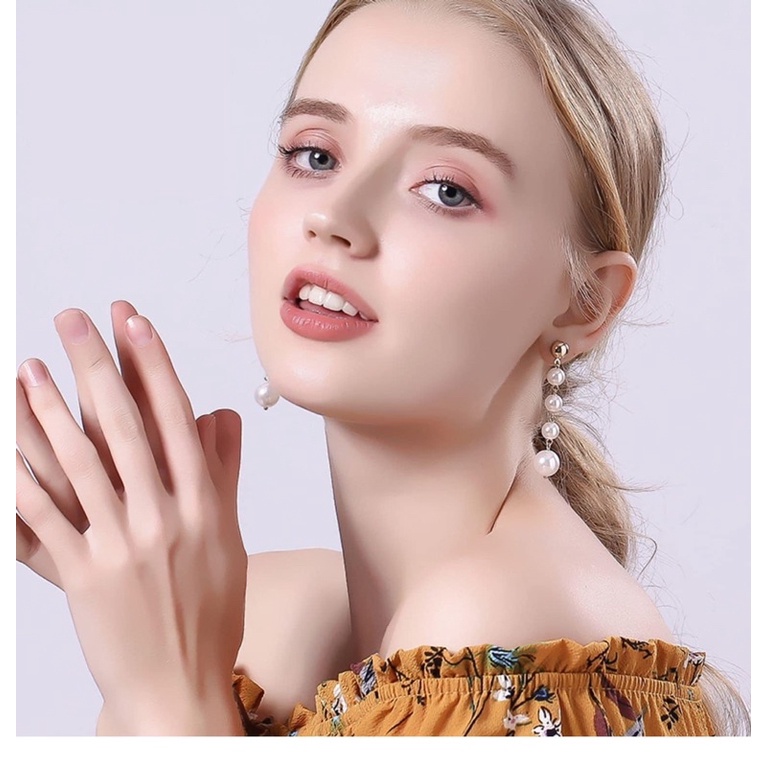 Bông tai Ngọc trắng dài 3 hạt đến 4 hạt..