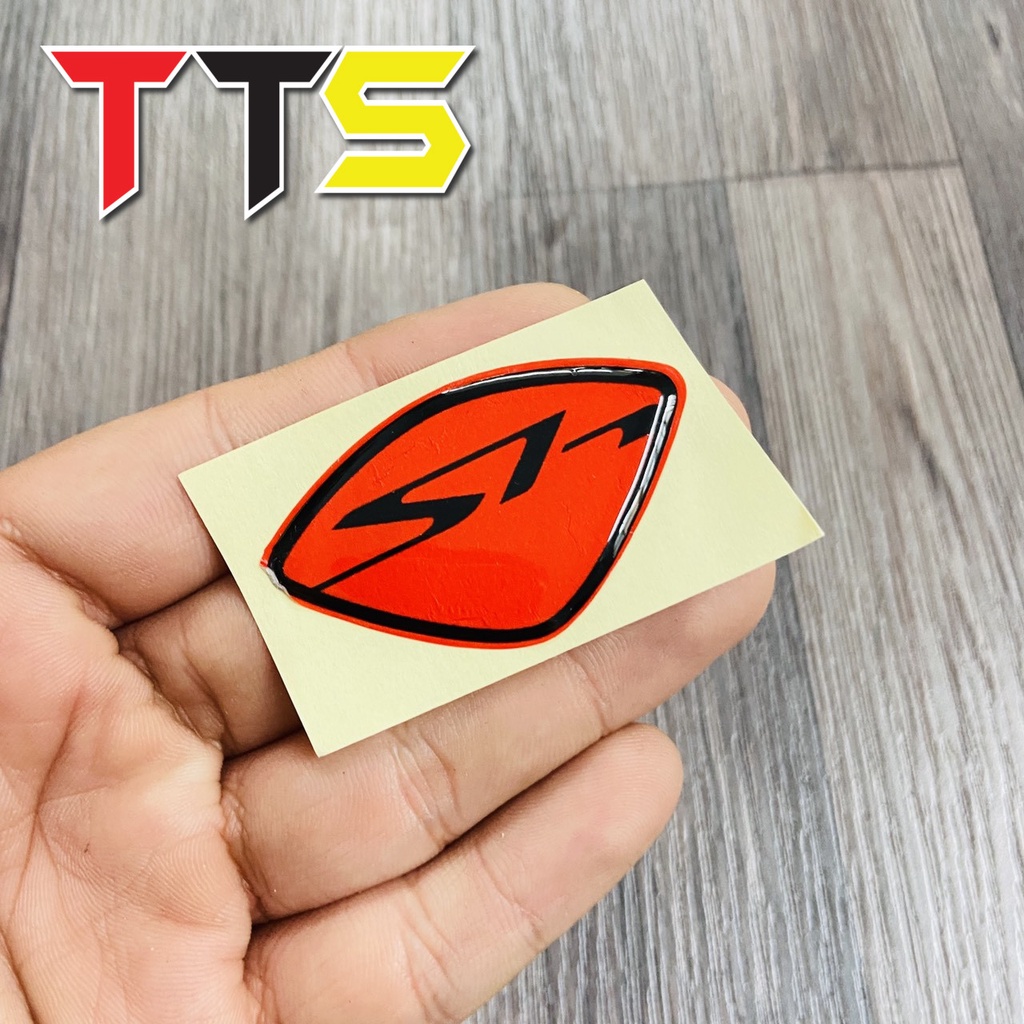 Logo tem chữ SH dán mặt nạ chất liệu nhựa dẻo nổi nhiều màu sắc đẹp mắt