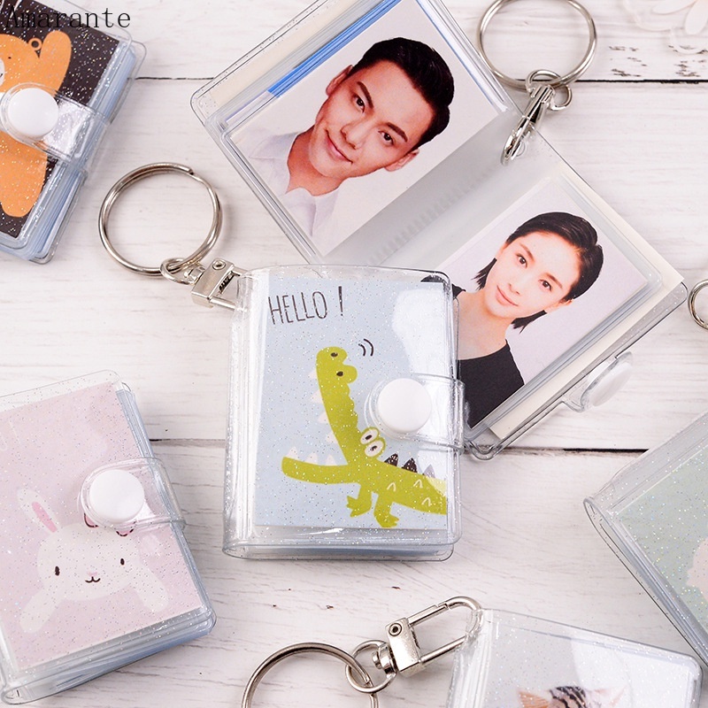 Album Ảnh 1 Inch 16 Ngăn Trong Suốt Lấp Lánh Kèm Móc Khóa