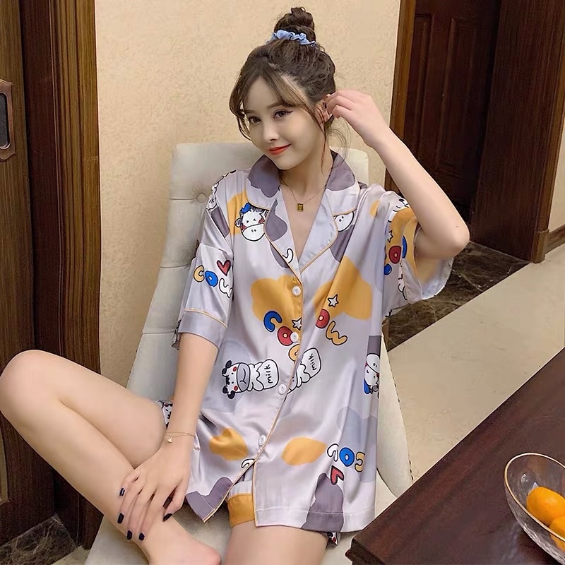 Bộ đồ ngủ pijama nữ cộc tay quần đùi vải Kate Thái mềm mịn màu tím nhạt họa tiết hoạt hình - CD0015
