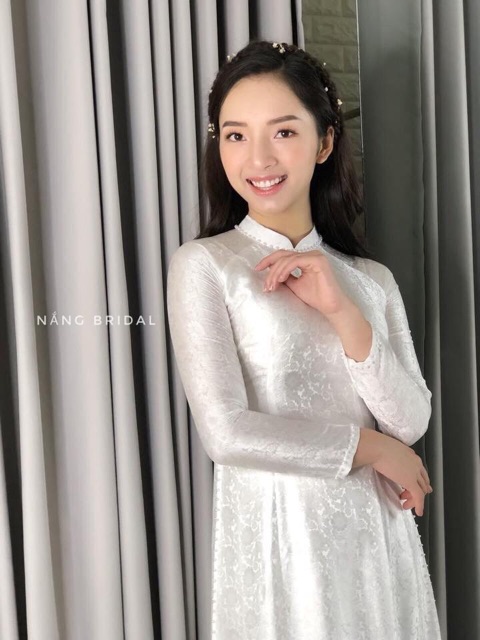 Áo dài gấm đính trai