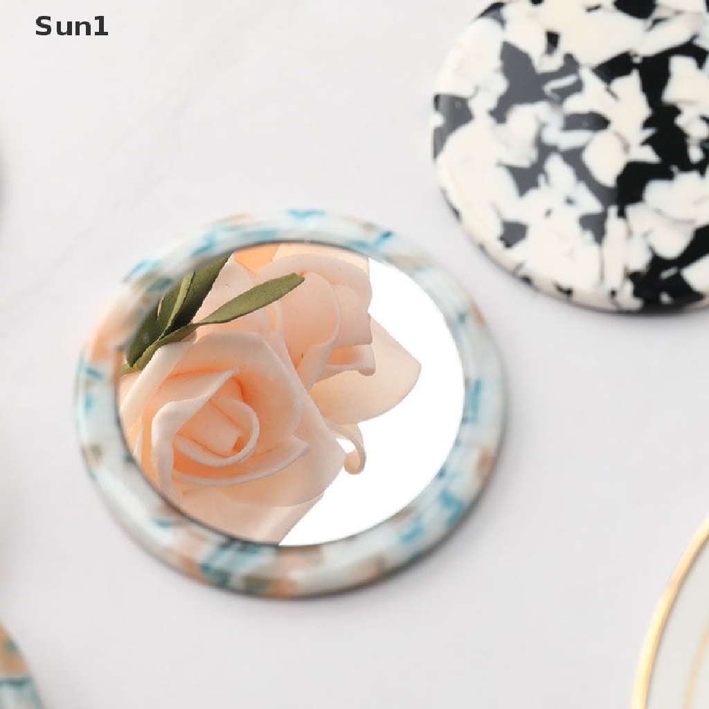 Gương trang điểm mini hình tròn chất liệu axit axetic tiện dụng