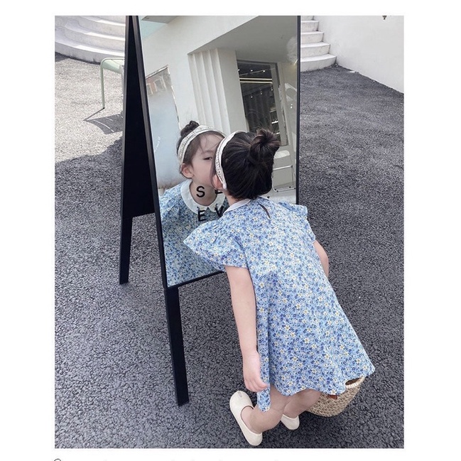 Váy Next hoa nhí xanh - cổ sen thêu hoa cho bé gái