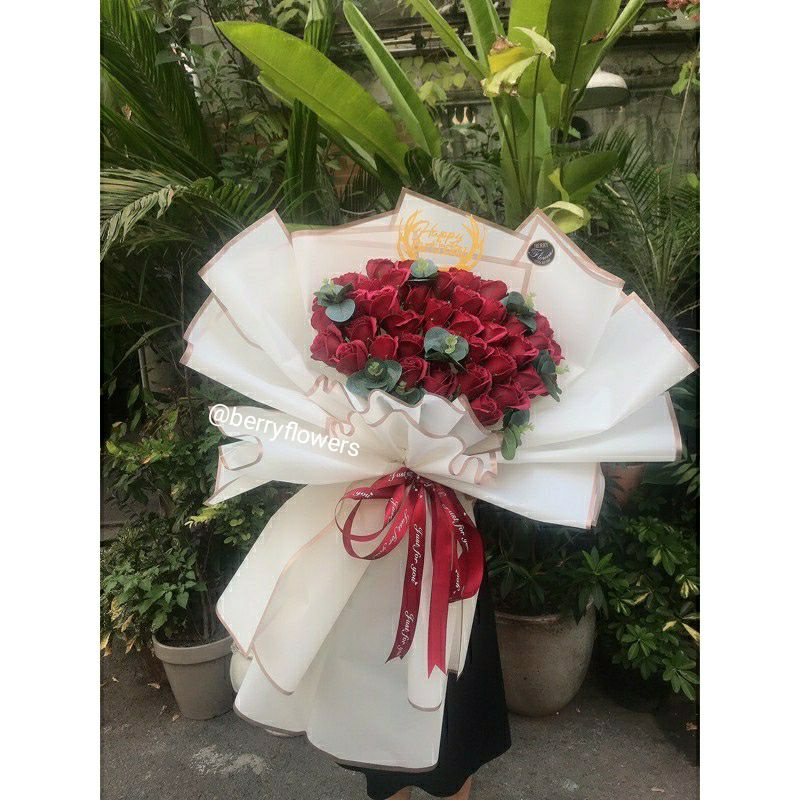 Bó bông sáp đỏ đô giao TPHCM