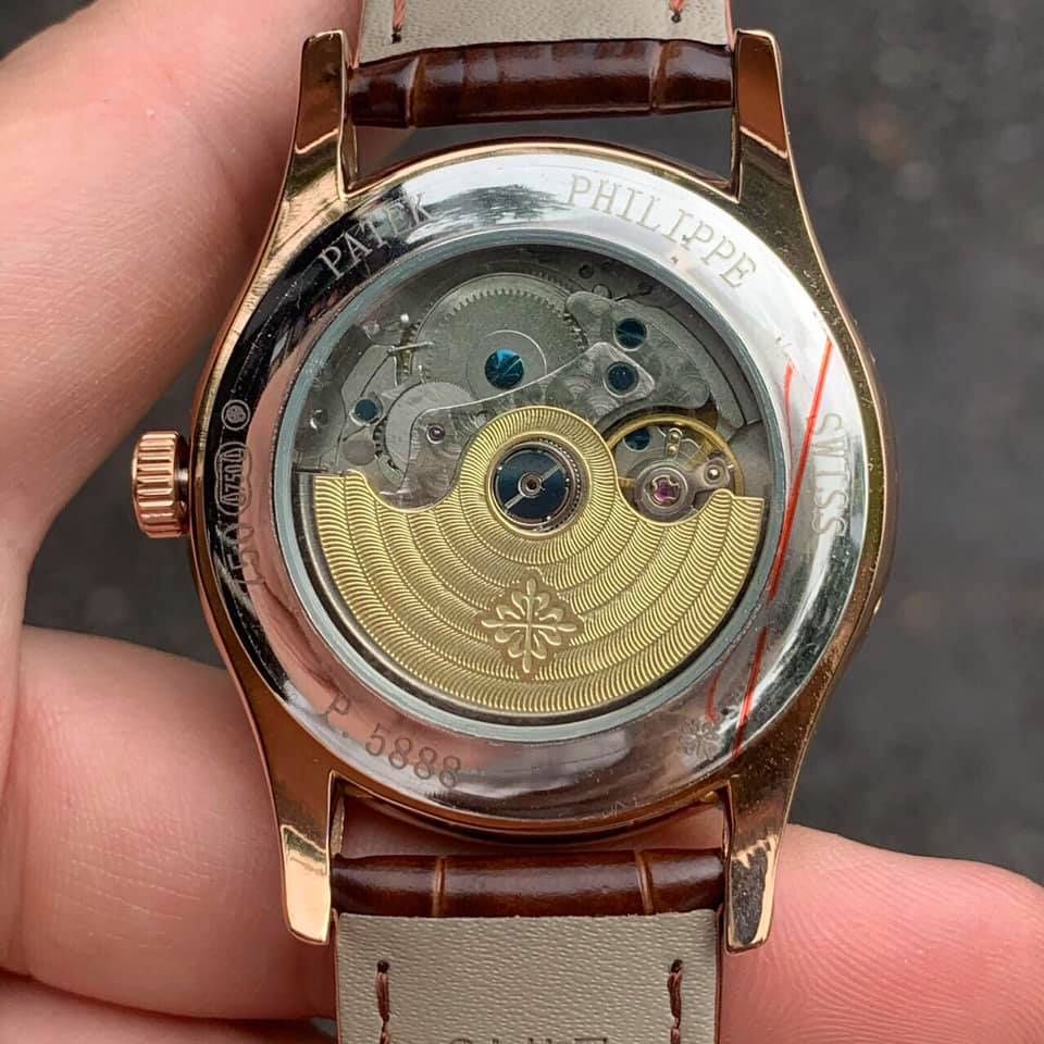 Đồng hồ Nam Ptek vành đá trăng sao máy nhật chạy cơ Automatic có thứ ngày tháng vỏ vàng dây da