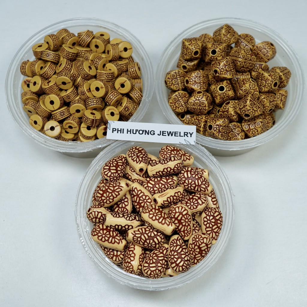 Gói 10g - 25g hạt nhựa giả gỗ nhiều hoa văn dùng xỏ vòng tay, trang trí handmade
