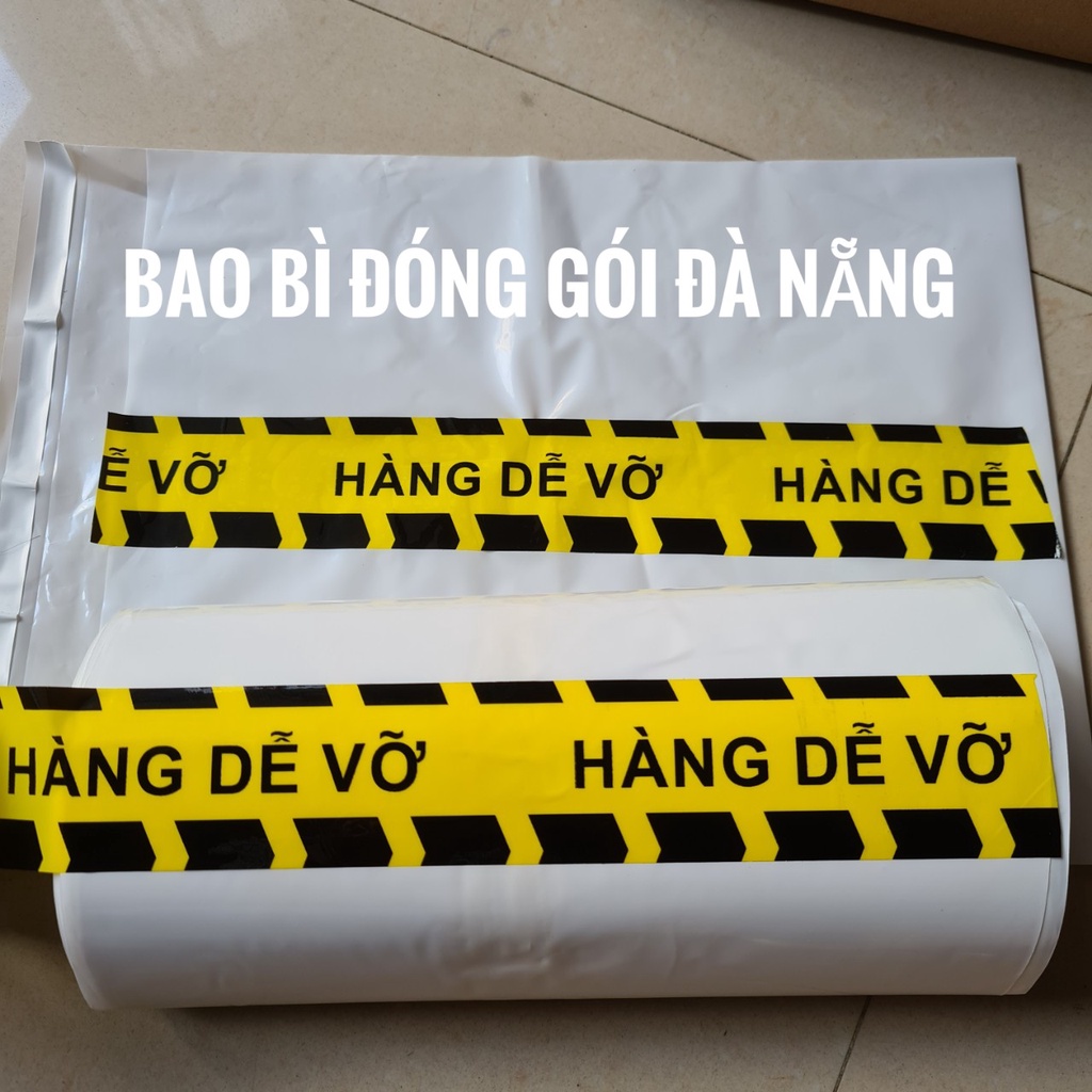Băng Keo Hàng Dễ Vỡ, bản 48mm, 100 Yard. Loại tốt, băng dính chắt, mực in rõ nết