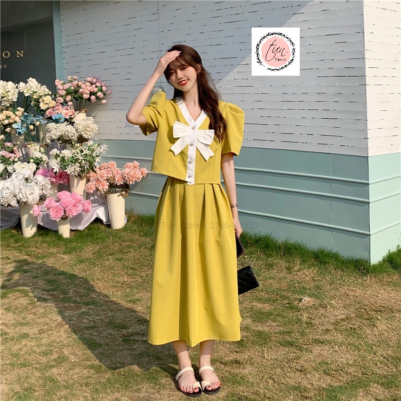 Set áo + chân váy dự tiệc,áo croptop dáng tay bồng phối nơ ngực và chân váy dài qua gối,lịch sự công sở