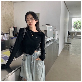 Áo tay dài xéo tà viền chỉ nỗi