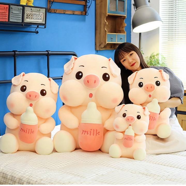 Gấu nhồi bông heo hồng ôm bình sữa siêu cute làm gối ôm đi ngủ, làm quà tặng - Morning store