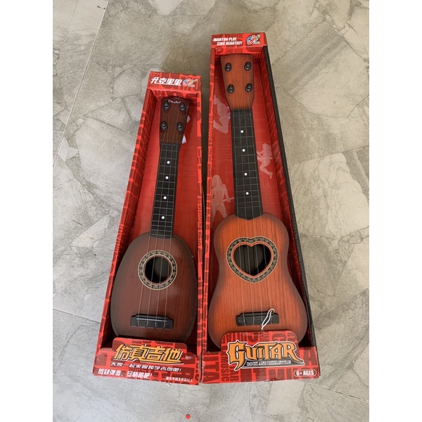 Đàn Ghita Nhựa Cho Bé - Đàn Ukulele Mini Giả Gỗ