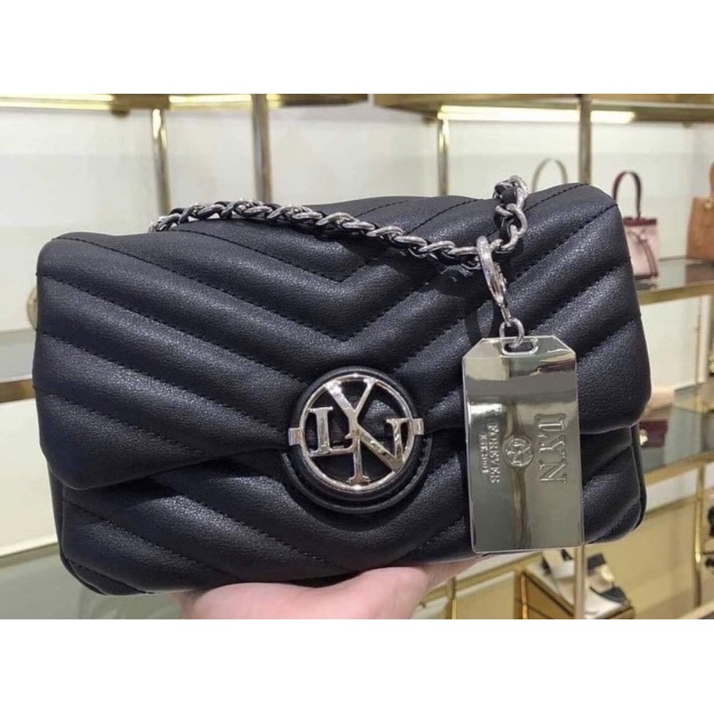 Túi lyn đeo chéo khoá tròn