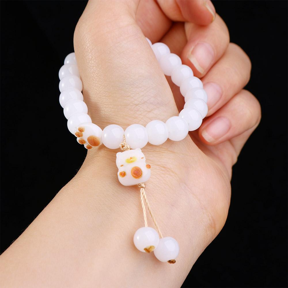 Vòng Đeo Tay Hạt Thủy Tinh Hình Dấu Chân Thỏ Dễ Thương Dành Cho Nữ